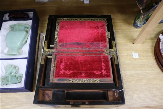 An inlaid mother of pearl papier mache writing box